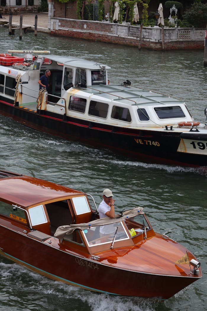 client-stories-img canal-boats-in-venice-italy-on-a-summer-day-33767357